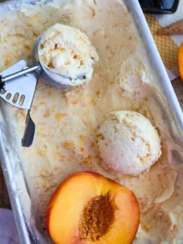 Peach ice cream with slices of peach