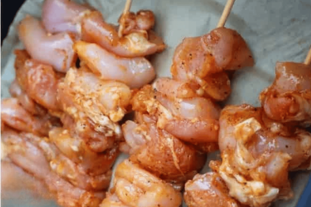 Cubed chicken on a skewer