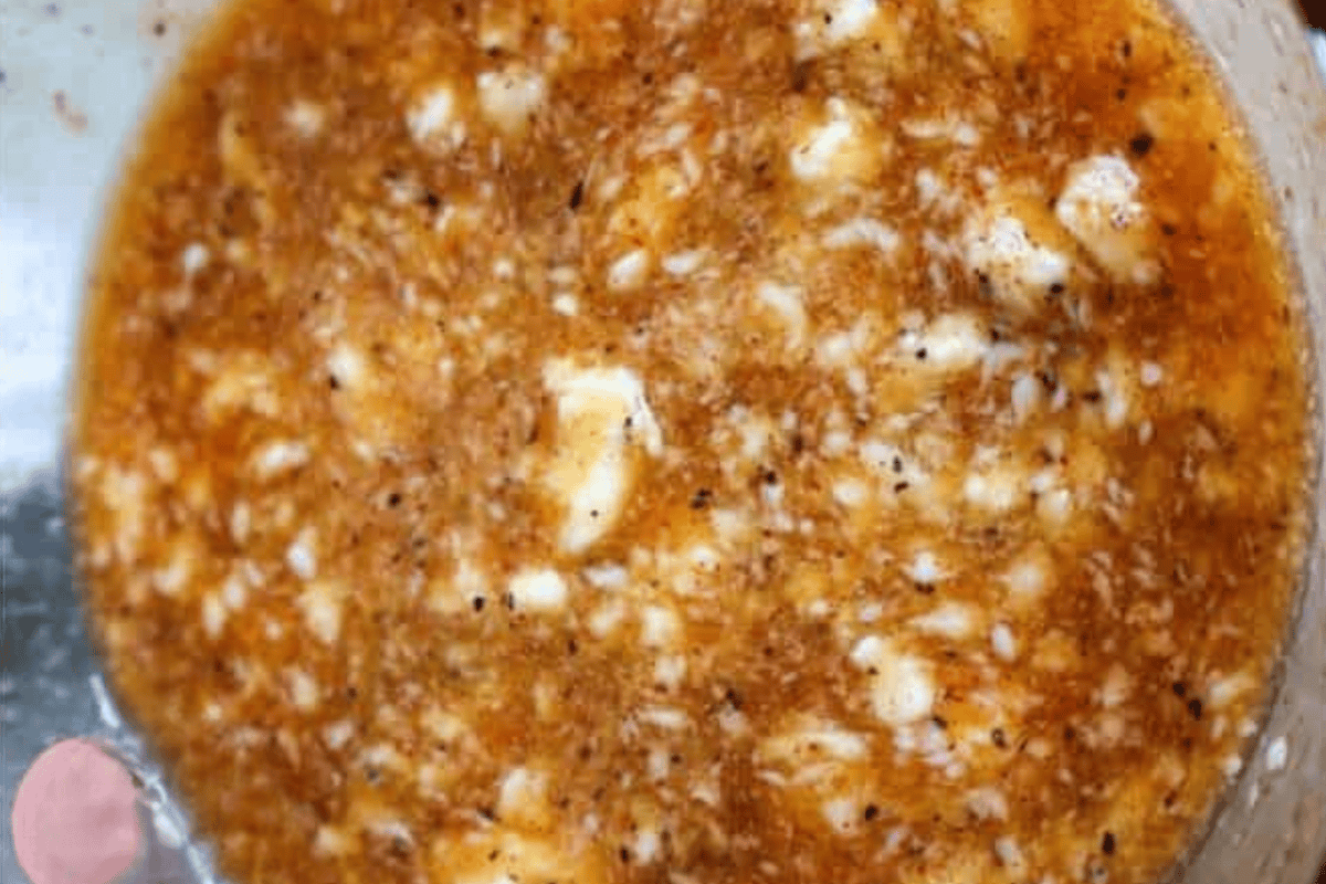 butter and seasoning and lemon about to be melted into a sauce.