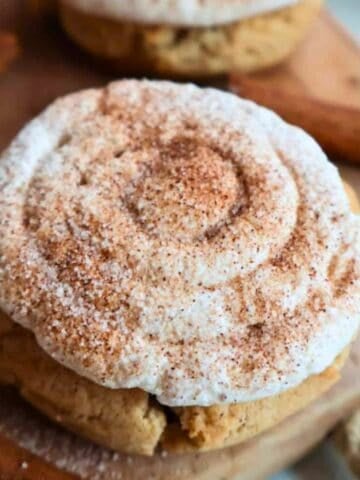 A gluten free snickerdoodle cookie with frosting.