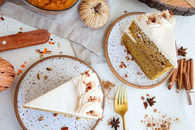 slices of pumpkin cake with cinnamon sticker and golden fork