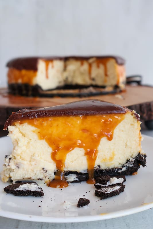 a close up of a chocolate ganache cheesecake