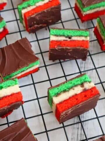 Gluten Free Italian Rainbow Cookies on a cooling rack.