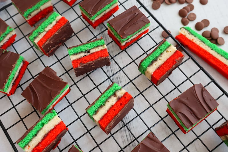 rainbow cookies in a cooling rack