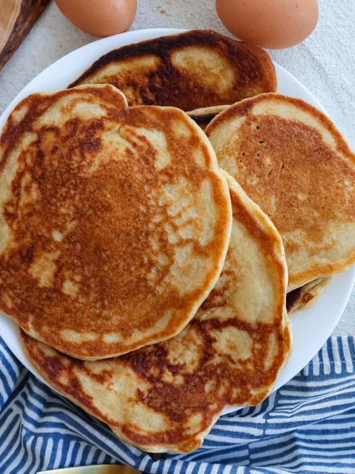 Overhead shot of plateful of pancakes.