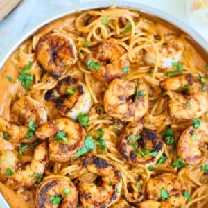 A skillet of Cajun Creamy Shrimp Pasta.