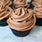 Chocolate Buttercream Frosting on top of a chocolate cup cake.