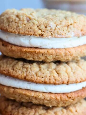A stack of 3 Gluten Free Oatmeal Cream Pies.