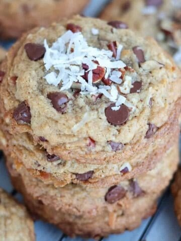 Stack of coconut chocolate chip cookies.