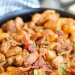 Closeup shot of bowlful of gnocchi in sauce.