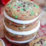 Three Christmas cookie sandwiches stacked atop one another