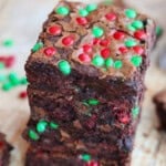 M and M brownies stacked atop one another.