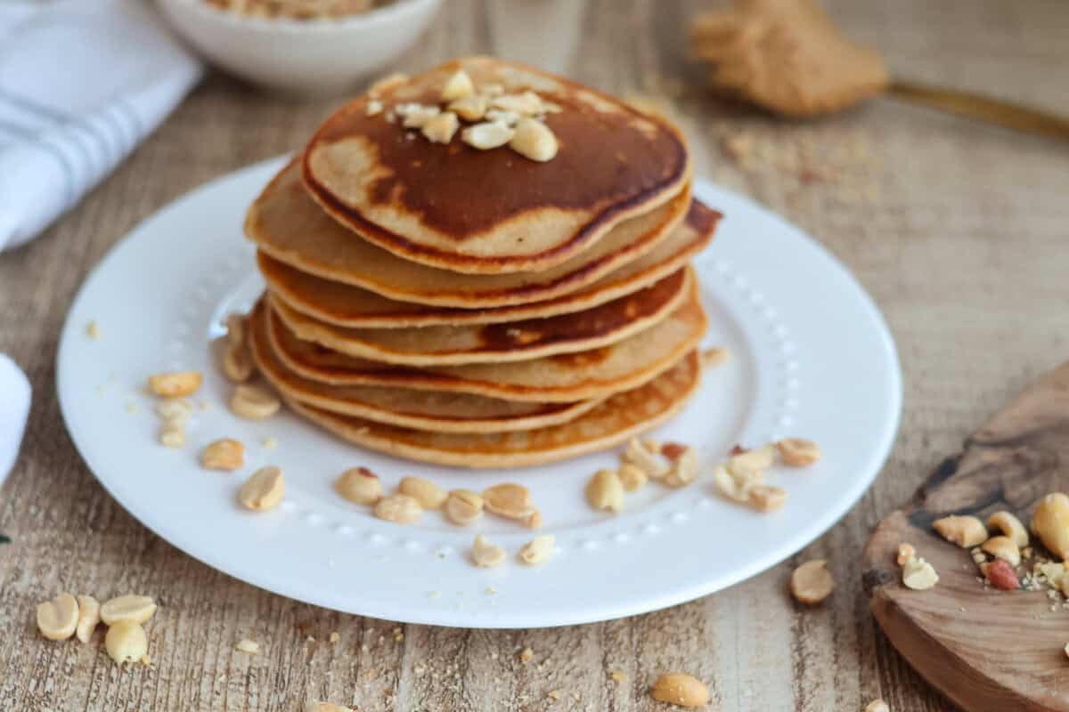 Plate with a stack of pancakes.