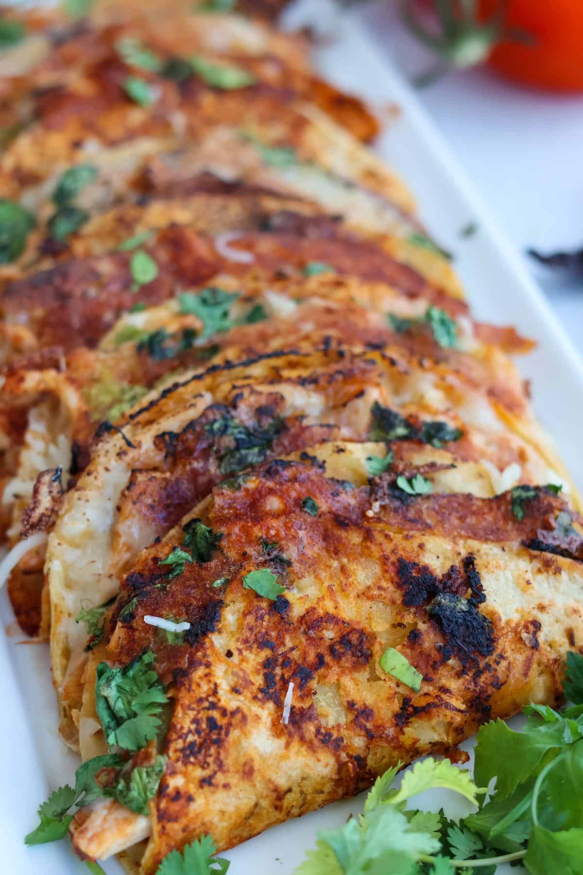 A plateful of chicken tacos.