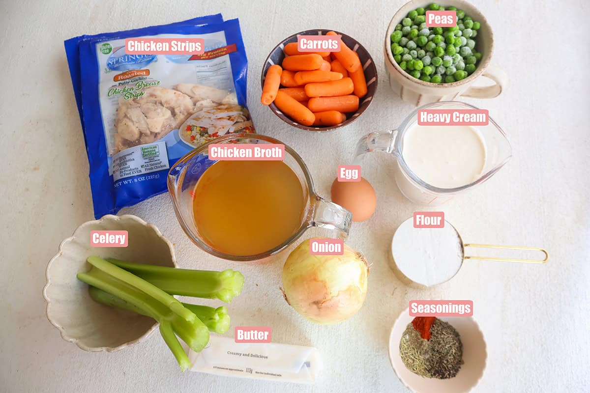 Individual pot pie ingredients in bowls. 