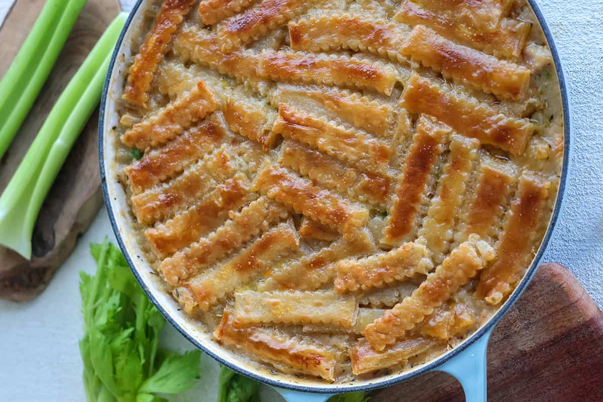 A skillet full of cooked chicken pot pie. 