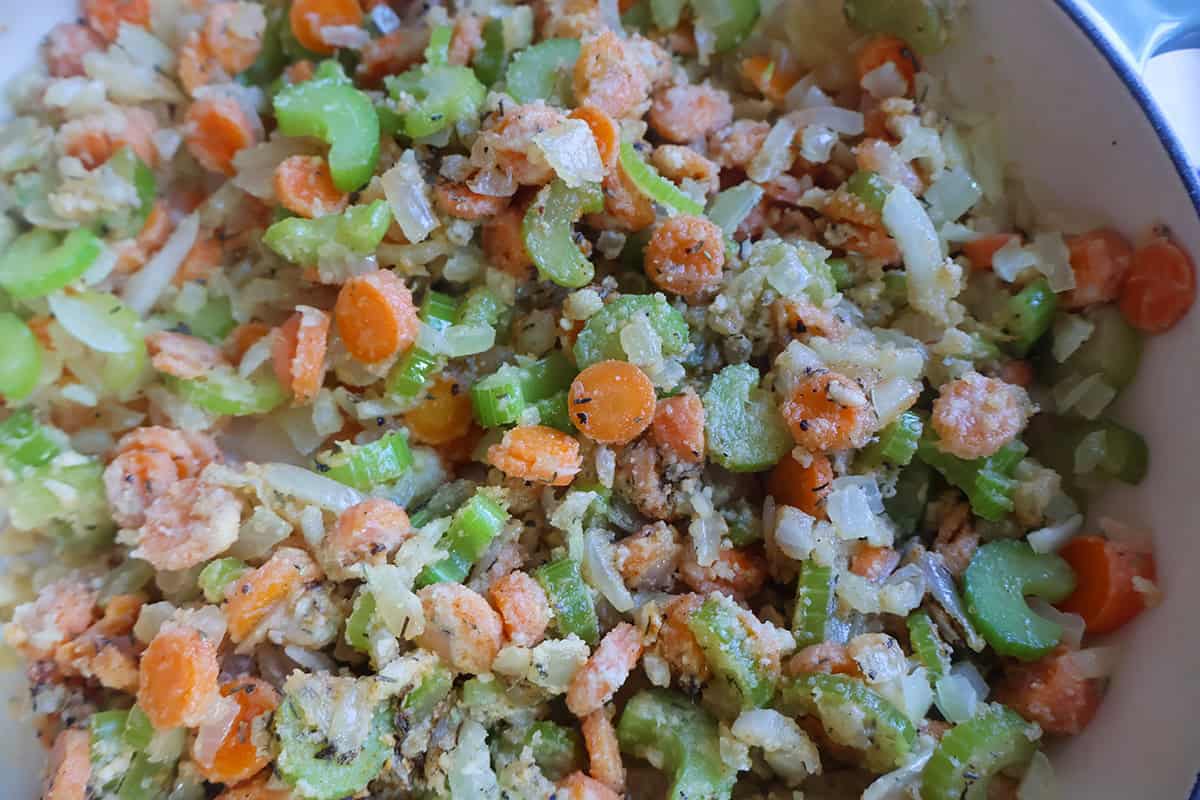 Sauted vegetabls in a skillet.