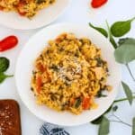 A plate of Spinach Artichoke Baked Orzo Pasta.