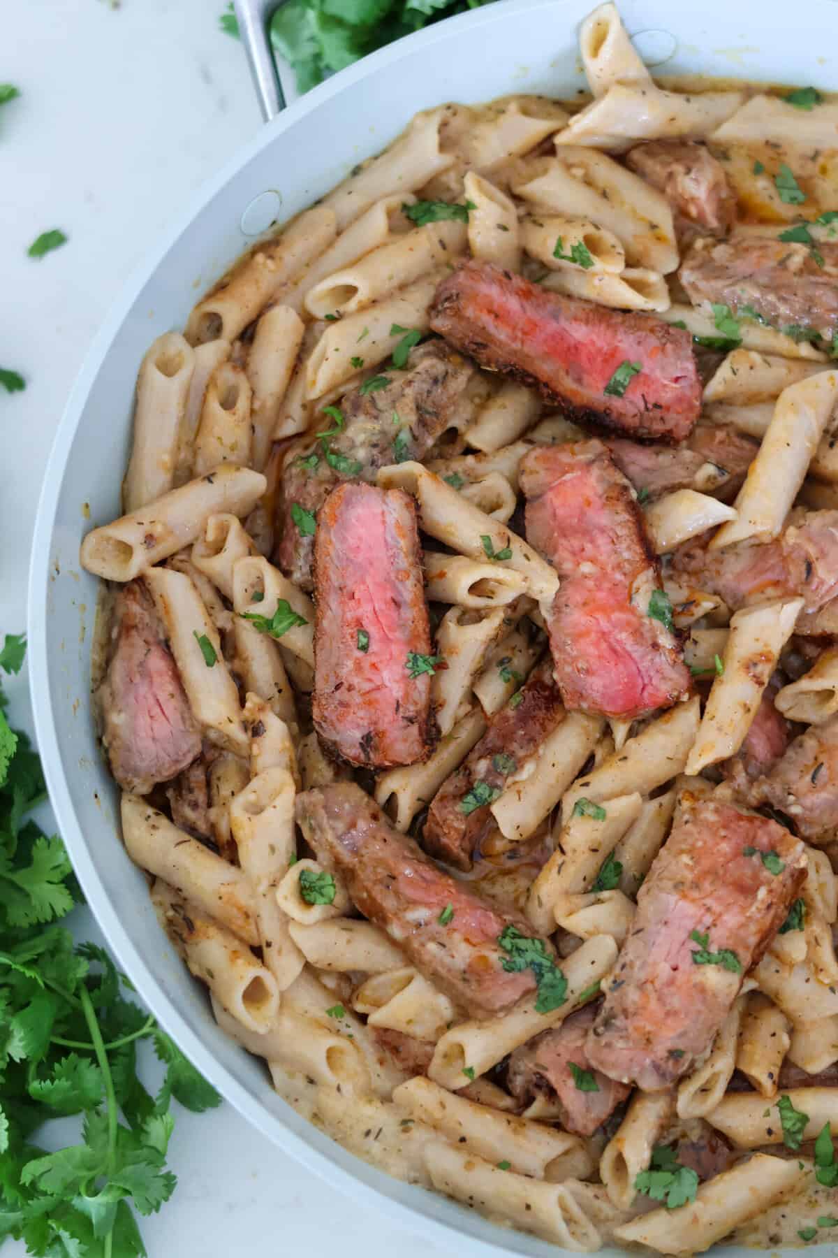 A pan of Creamy Garlic Steak Pasta