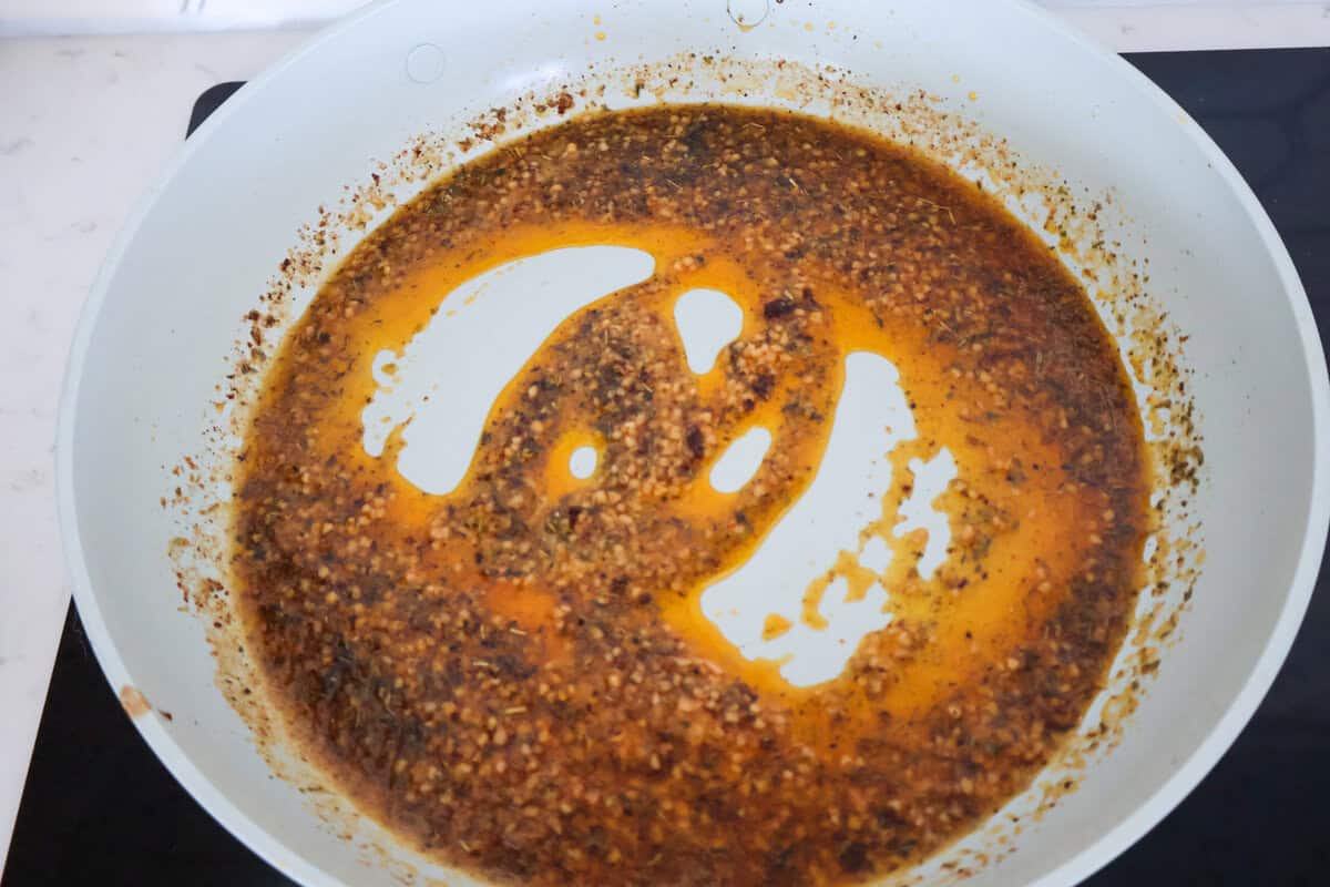 The start of a creamy garlic sauce for steak pasta.