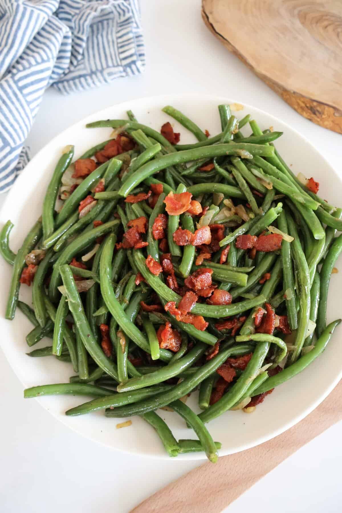 A plate of Green Beans with Bacon and Onions after just being cooked.