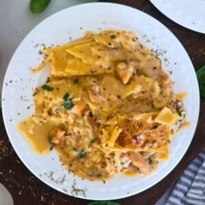 Gluten Free Chicken Alfredo on a white plate.