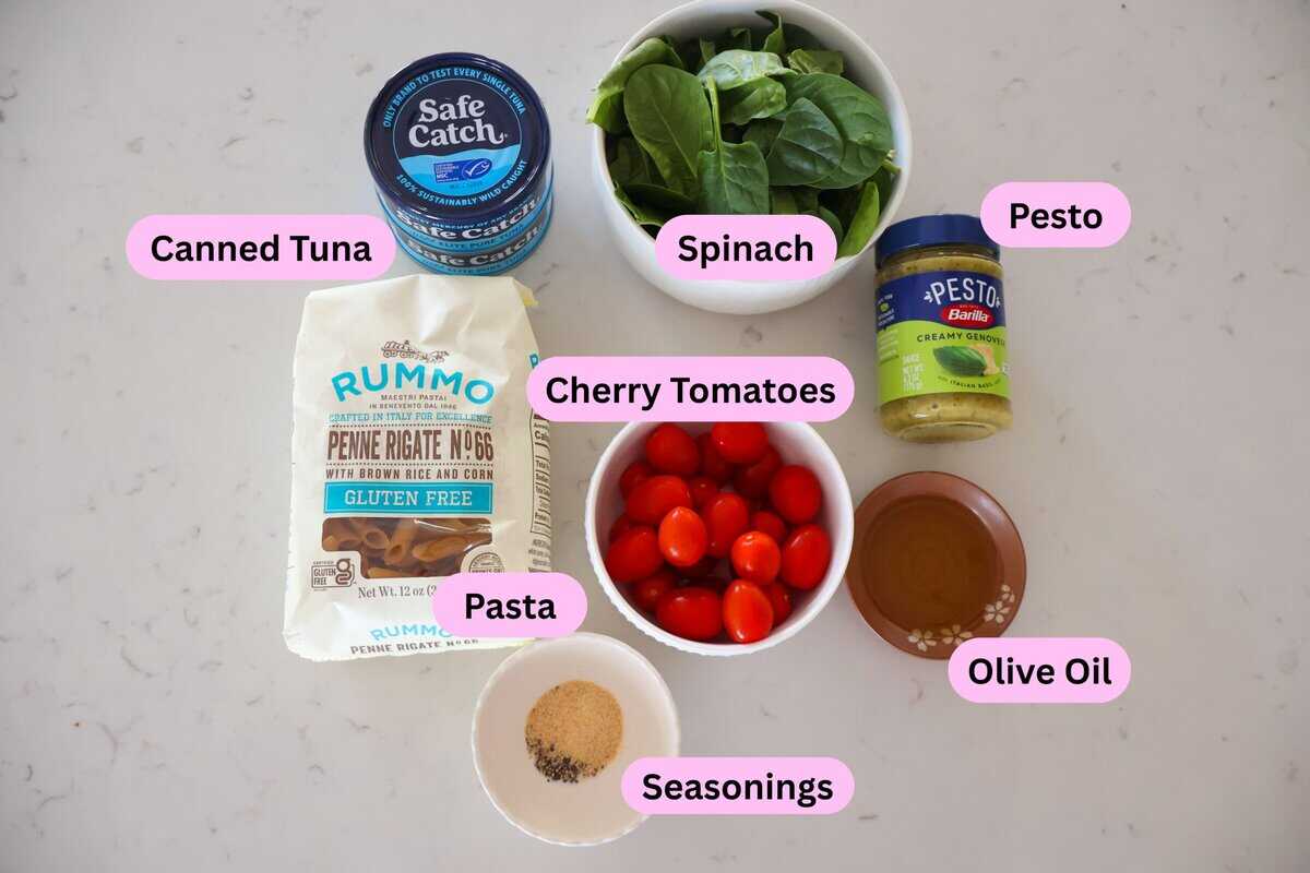 Pasta with Pesto and Tuna ingredients labeled on a white counter.