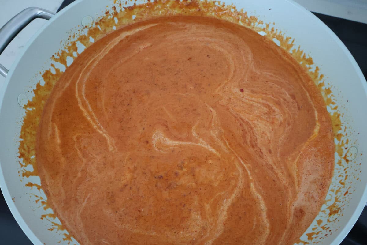 A sauce pan of creamy chorizo sauce.