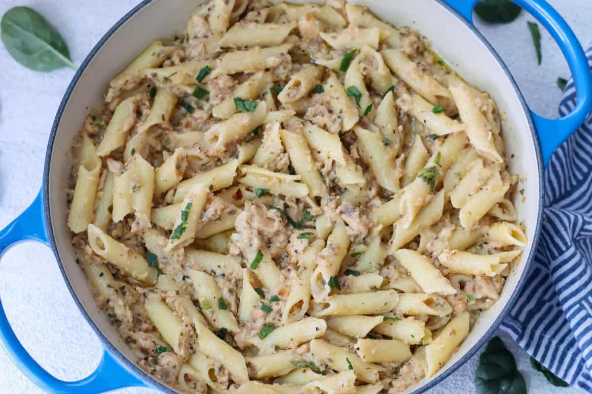 A pan of canned salmon with pasta.