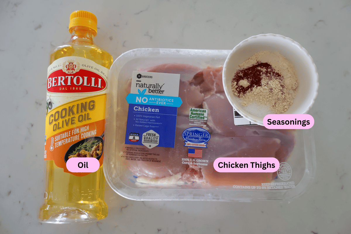 Ingredients for George Foreman chicken thighs labeled on the counter.