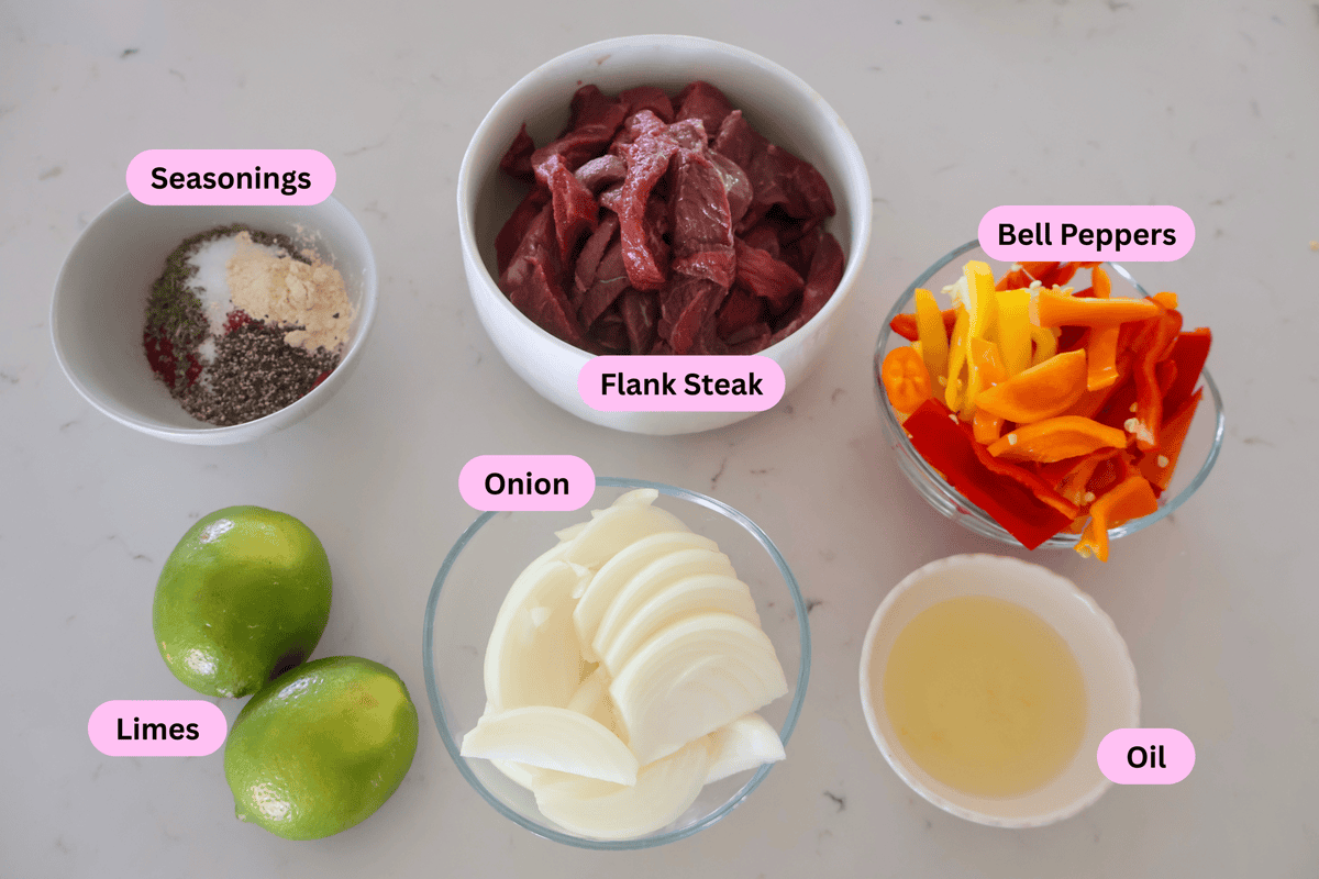 Ingredients for sheet pan Fajita Steak labeled on the counter.