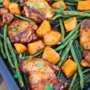 A sheet pan of chicken, green beans and sweet potatoes.