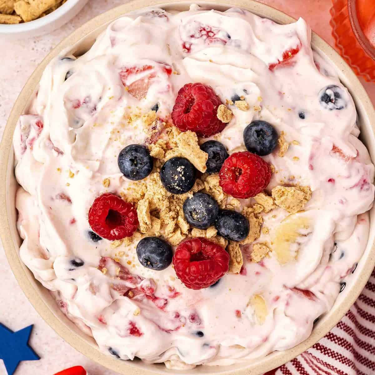 A bowlful of pink 4ht of July cheesecake salad.