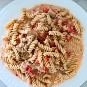 A plate of cream sausage pasta.