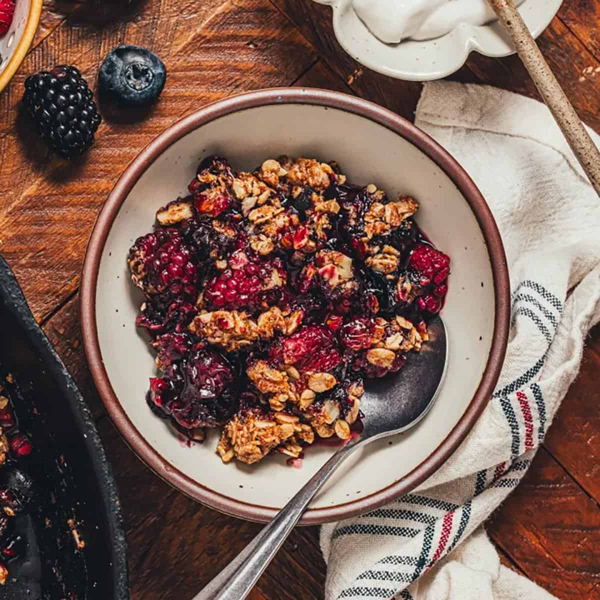 A bowlful of mixed berry crumble.