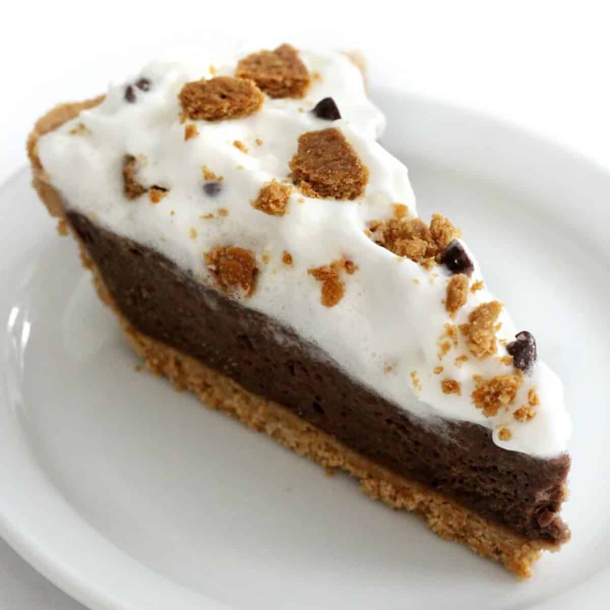A slice of s'mores pie on a white plate.