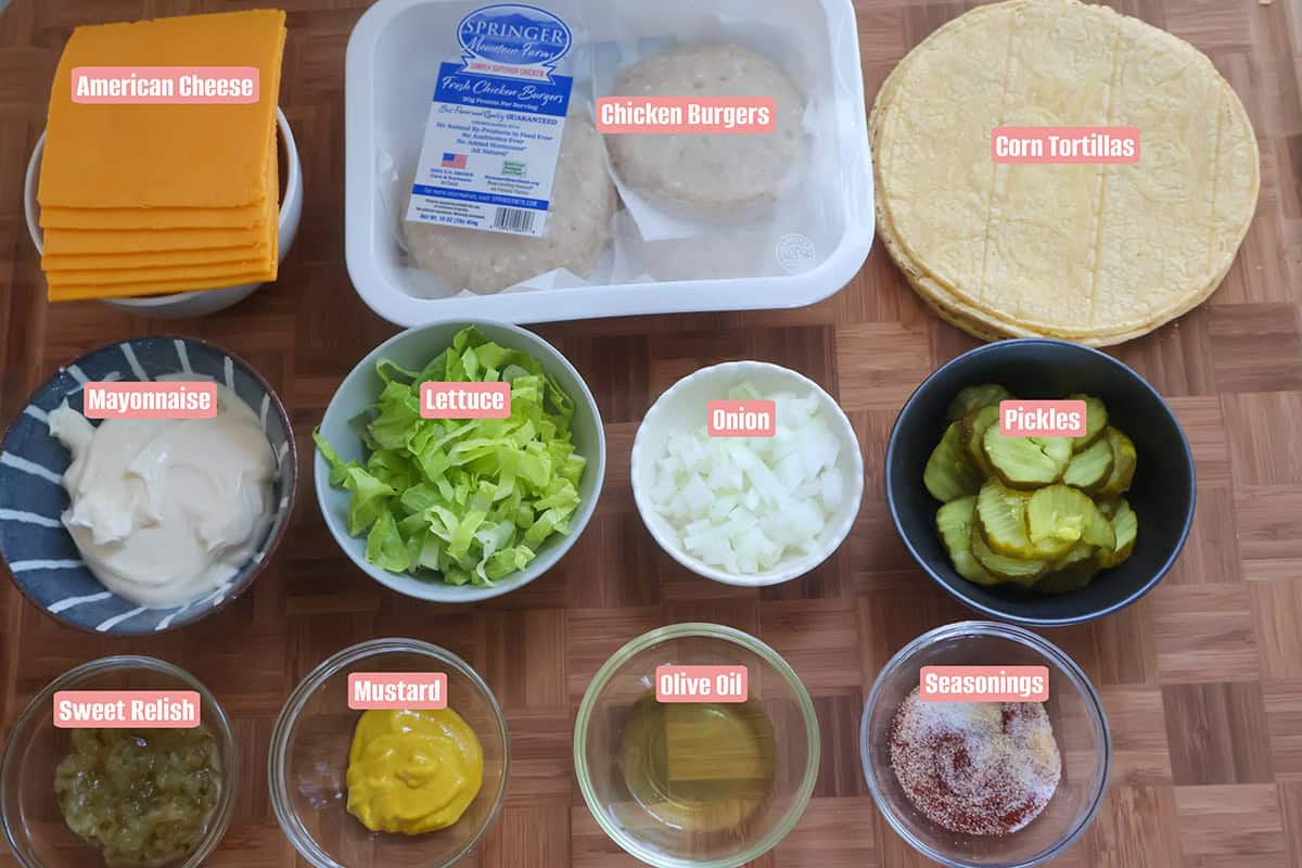 Individual Big Mac taco ingredients in bowls on a table.