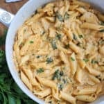 Skillet full of creamy chicken pasta.