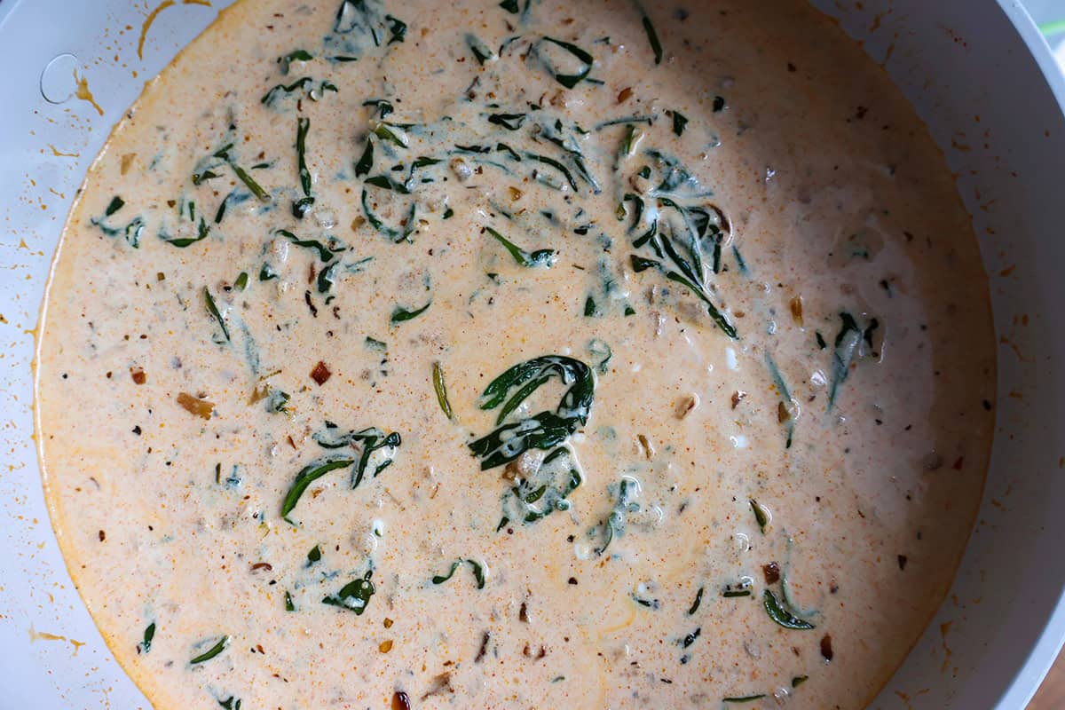 Sour cream pasta sauce in a skillet.