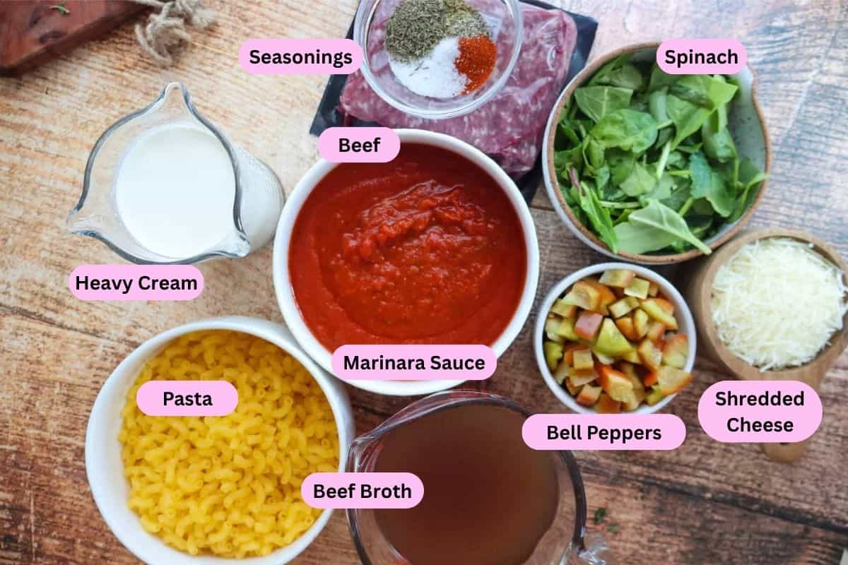 Ingredients for gluten free hamburger helper labeled on a cutting board.