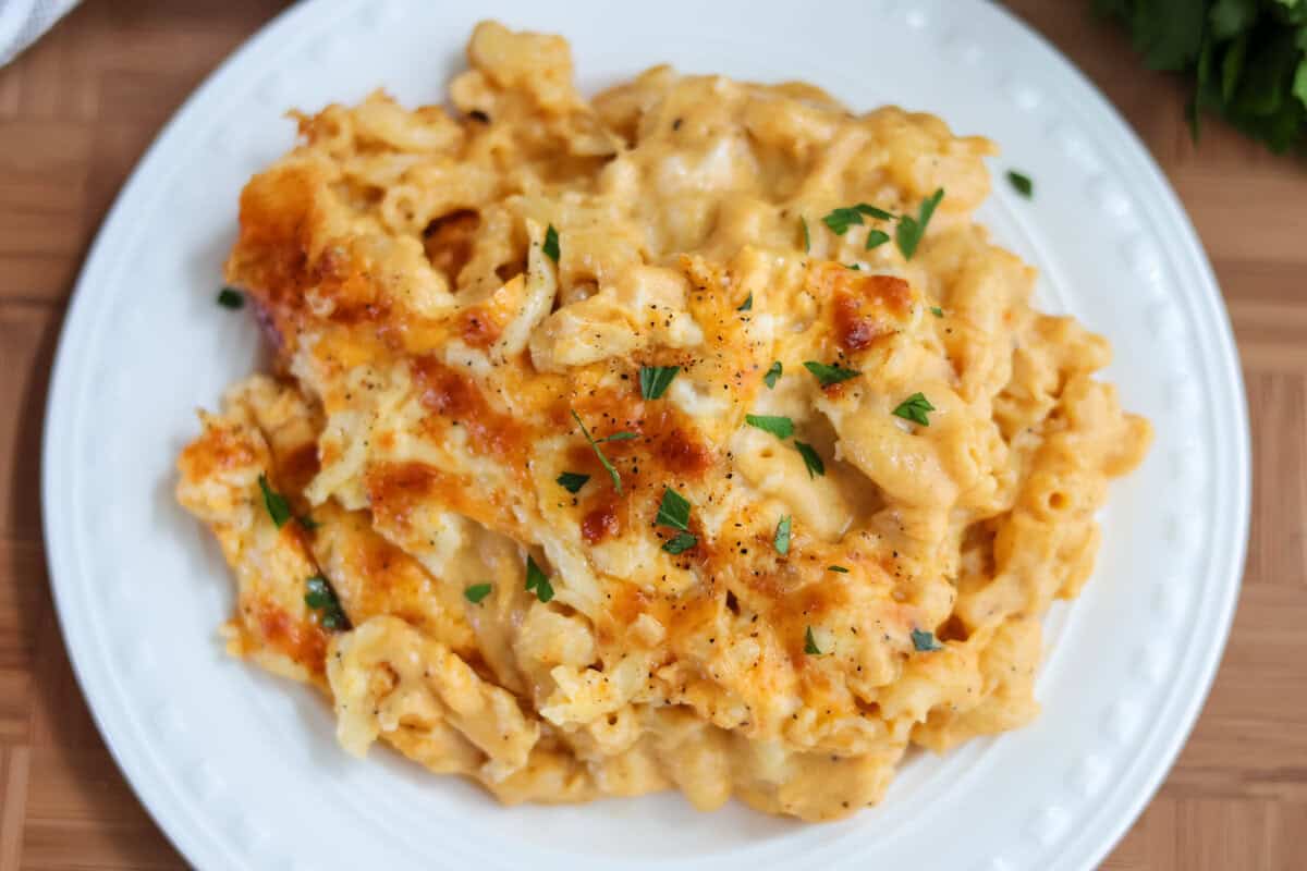 Gluten free skillet mac and cheese on a white plate.