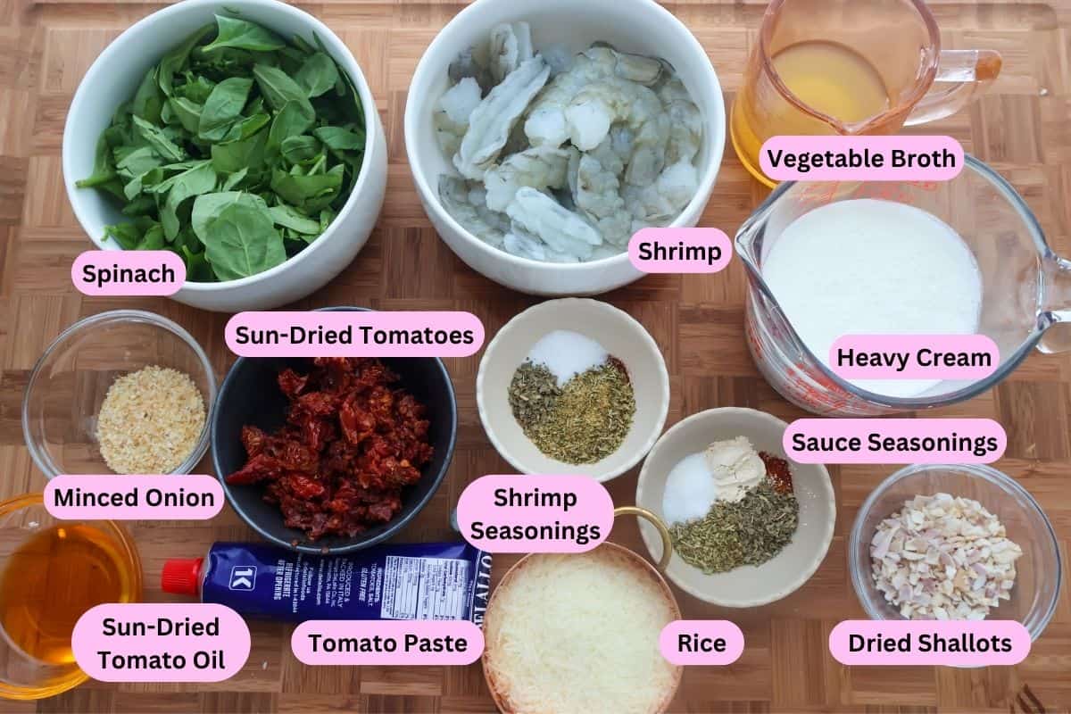 Ingredients to make a creamy Marry Me Shrimp Sauce labeled sitting on a wood cutting board.