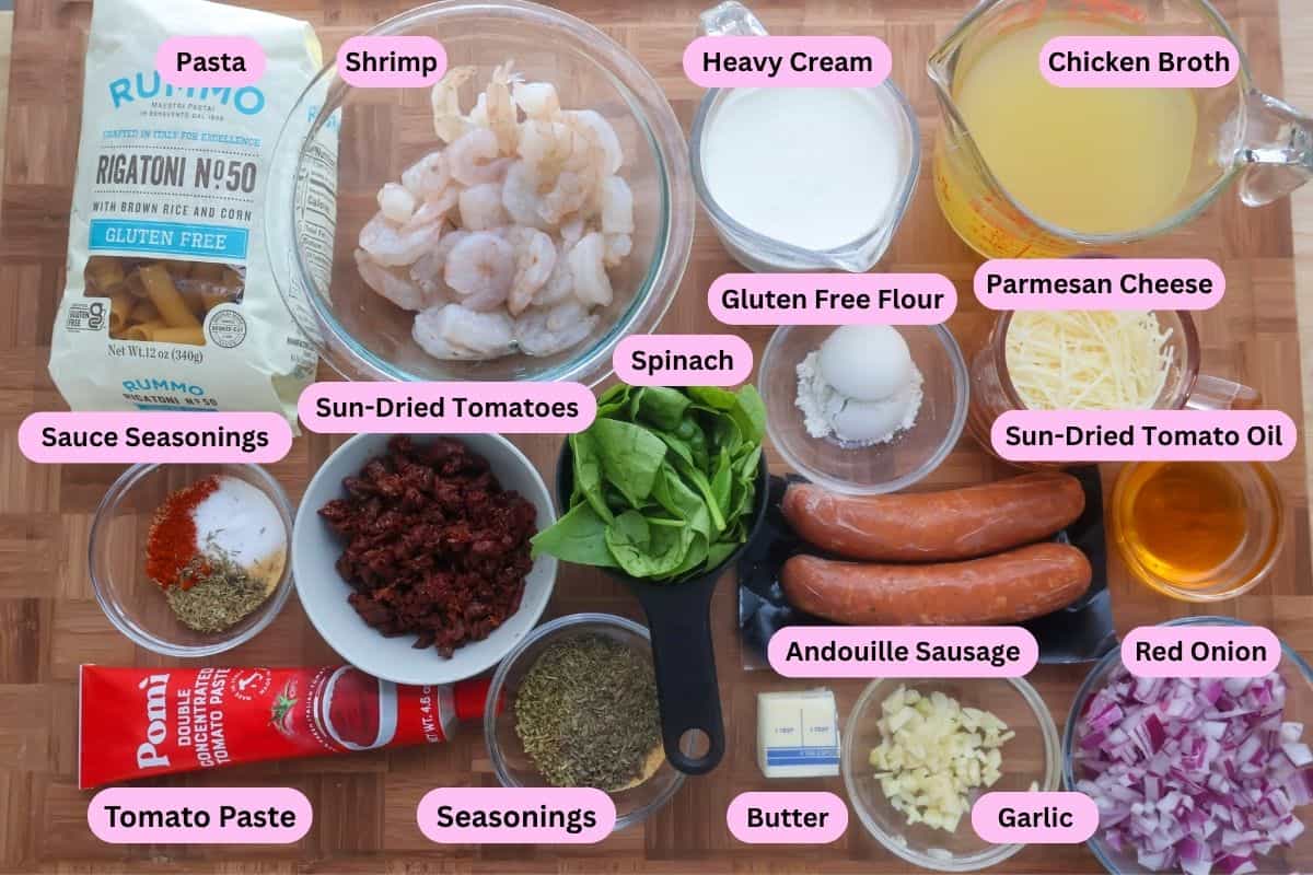 Ingredients for New Orleans Marry Me Pasta labeled on a cutting board.