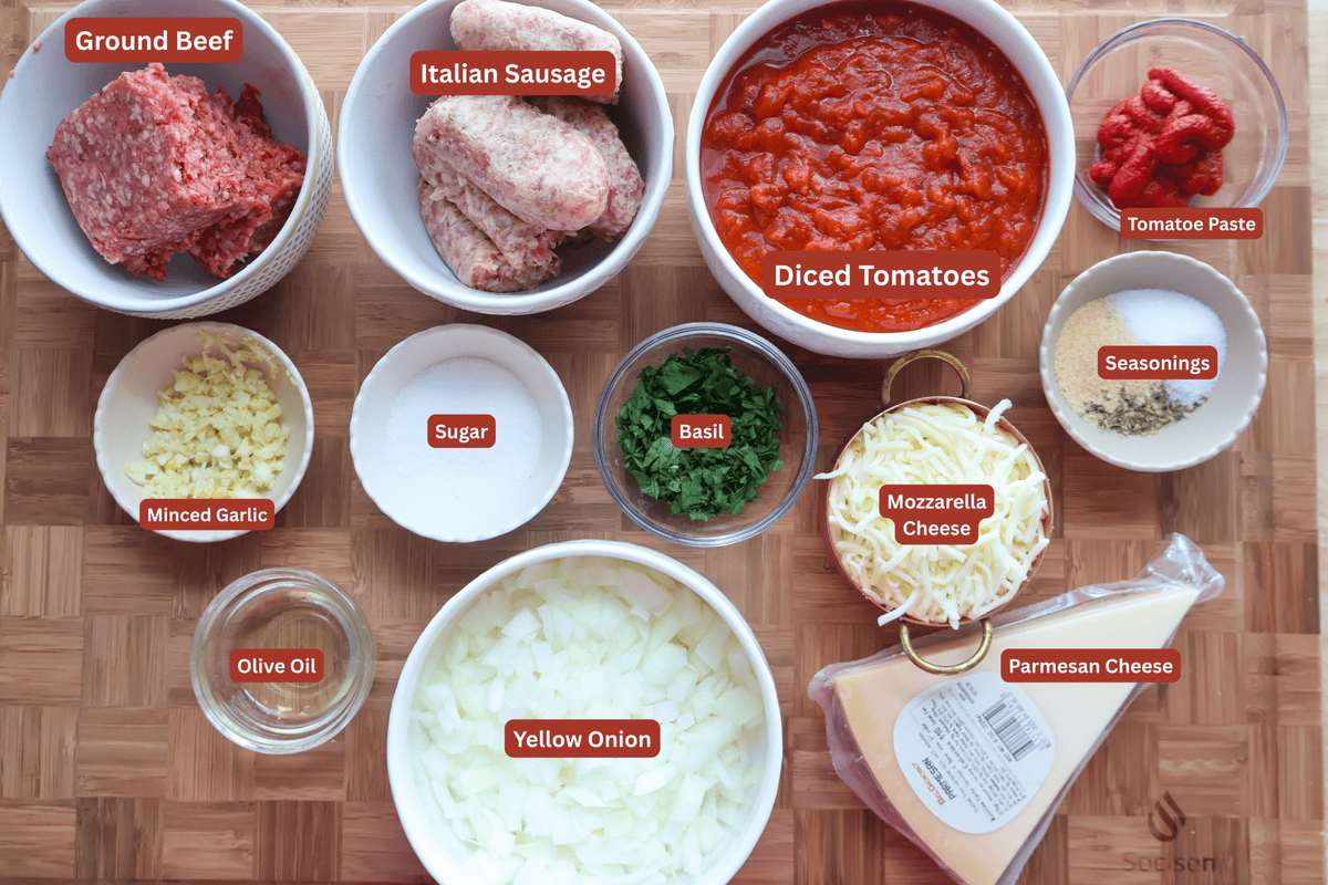Labeled lasagna soup ingredients including ground beef, Italian sausage, diced tomatoes, tomato paste, garlic, onion, basil, seasonings, sugar, olive oil, mozzarella and Parmesan cheese.