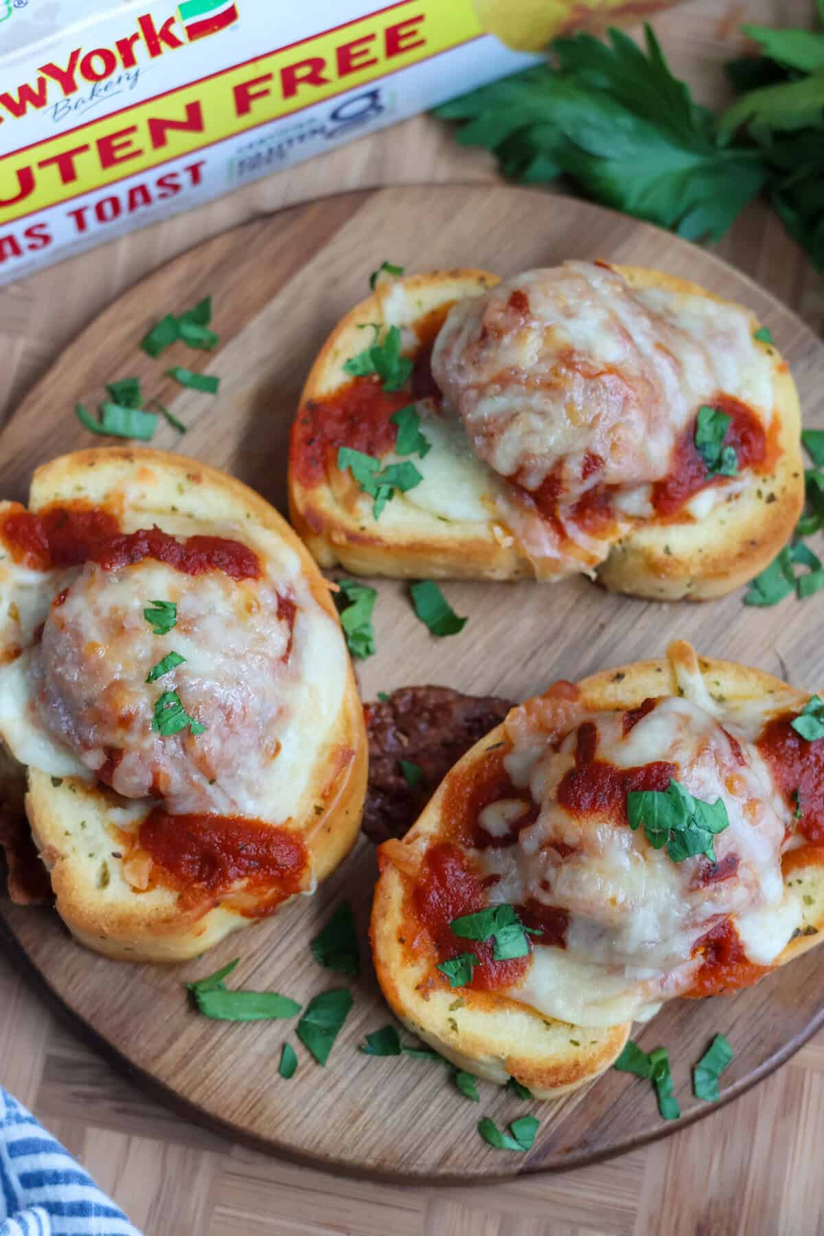 4-Ingredient Texas Toast Meatball Melts on a cutting board with the Texas toast box in the background