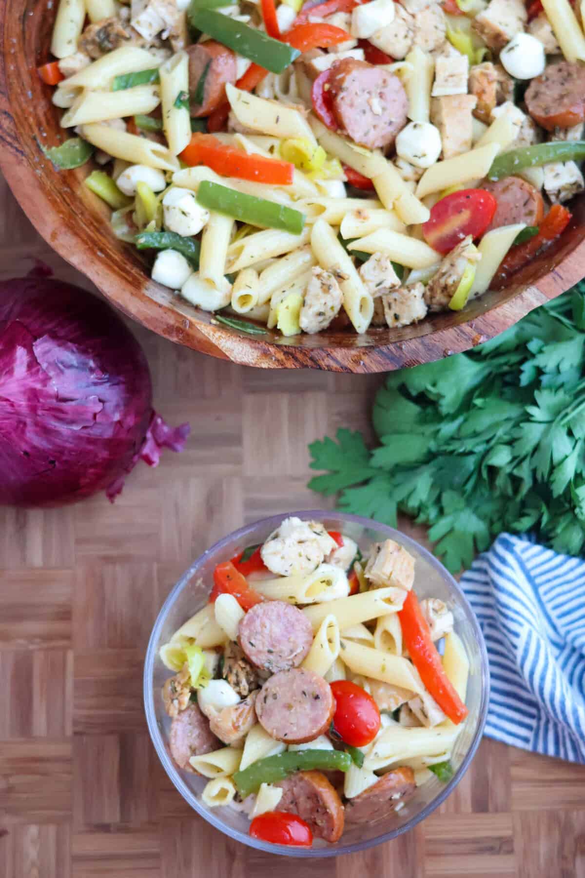 A serving of gluten-free pasta salad with Italian dressing, ready to eat.